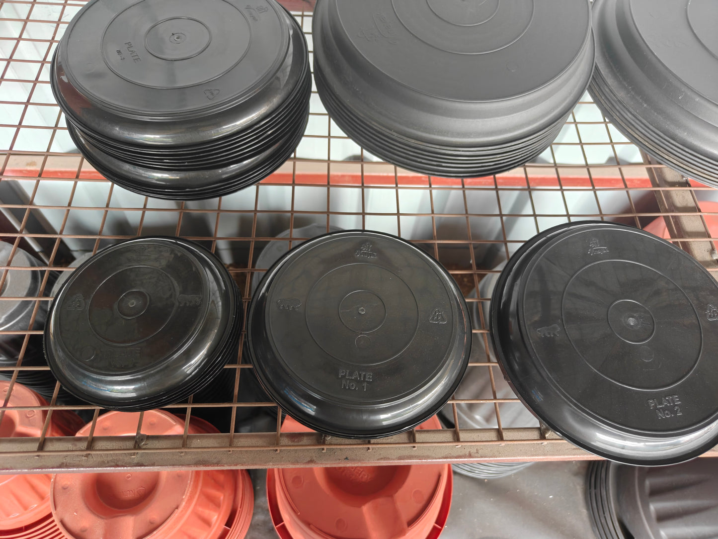 Black bottom plates black pots